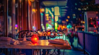 Late night restaurant outdoor seating in Chelsea, Manhattan on a warm summer night.
