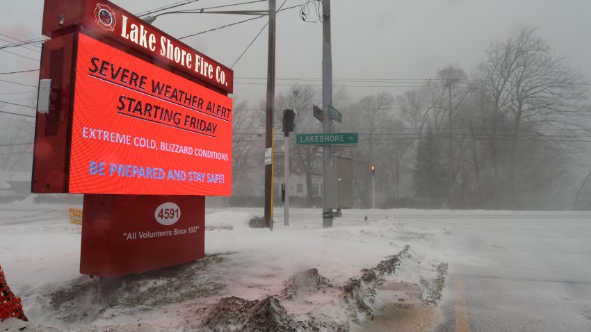 Snow and ice cover the roads along the Lake Erie Shoreline on December 23, 2022 in Hamburg, New York. The Buffalo suburb and surrounding area are expecting wind gusts over 70 miles per hour battering homes and businesses through out the holiday weekend. (Photo by John Normile/Getty Images)