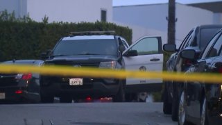 Crime scene tape in Beverly Crest after a fatal shooting.