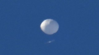 A Chinese spy balloon flies above Charlotte, N.C., Feb. 4, 2023.