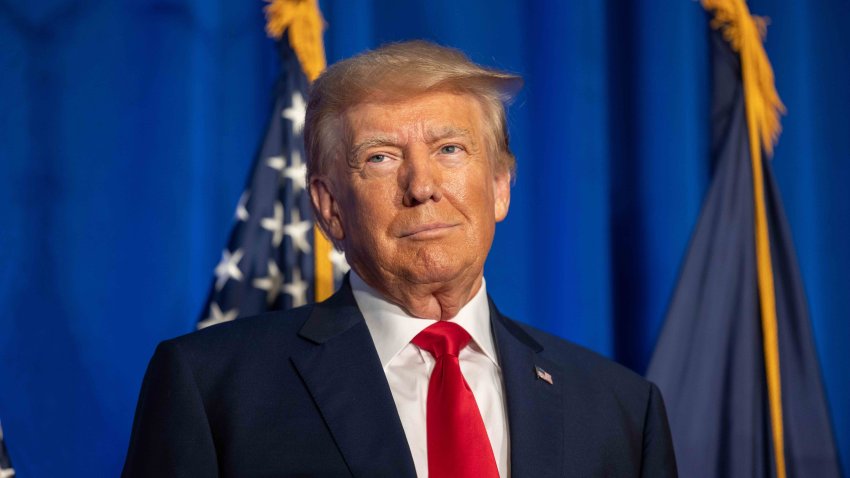 CONCORD, NEW HAMPSHIRE – JUNE 27: Republican presidential candidate, former U.S. President Donald Trump stands on stage after being introduced during the New Hampshire Federation of Republican Women’s Lilac Luncheon on June 27, 2023 in Concord, New Hampshire. Republican presidential candidate, Florida Gov. Ron DeSantis is also holding a campaign event in New Hampshire today. (Photo by Scott Eisen/Getty Images)