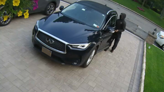 Footage from home security camera captures alleged thief take car out of Staten Island driveway.