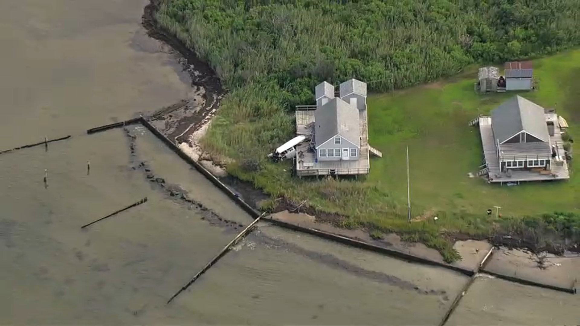 A boat crashed into a house on West Fire Island