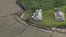 A boat crashed into a house on West Fire Island