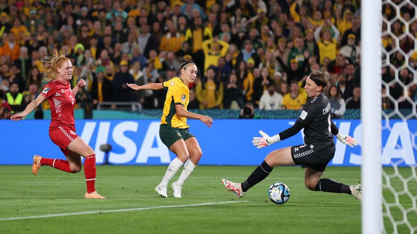 SYDNEY, AUSTRALIA – AUGUST 07: Caitlin Foord of Australia scores her team’s first goal during the FIFA Women’s World Cup Australia & New Zealand 2023 Round of 16 match between Australia and Denmark at Stadium Australia on August 07, 2023 in Sydney, Australia. (Photo by Brendon Thorne/Getty Images )