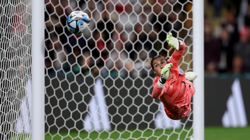 BRISBANE, AUSTRALIA – AUGUST 07: Mary Earps of England dives as Desire Oparanozie of Nigeria misses her team’s first penalty in the penalty shoot out during the FIFA Women’s World Cup Australia & New Zealand 2023 Round of 16 match between England and Nigeria at Brisbane Stadium on August 07, 2023 in Brisbane / Meaanjin, Australia. (Photo by Elsa – FIFA/FIFA via Getty Images)