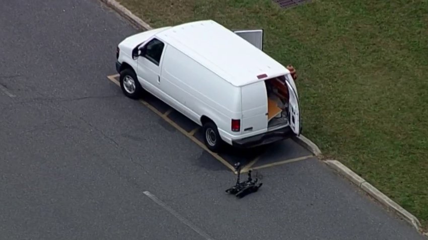 Bomb squad robot near van