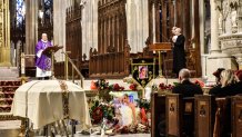 A priest delivers the eulogy at the funeral of transgender community activist Cecilia Gentili at St. Patrick's Cathedral. Gentili's funeral was the first time that St. Patrick's Cathedral held a funeral mass for a transgender person. (Photo by Stephanie Keith/Getty Images)