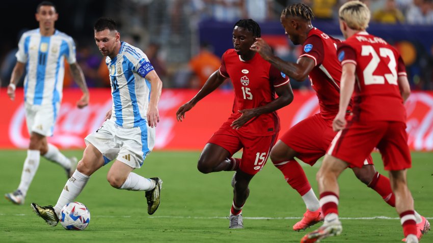 EAST RUTHERFORD, NEW JERSEY – JULY 09: Lionel Messi of Argentina drives the ball against Moïse Bombito of Canada during the CONMEBOL Copa America 2024 semifinal match between Canada and Argentina at MetLife Stadium on July 09, 2024 in East Rutherford, New Jersey. (Photo by Maddie Meyer/Getty Images)