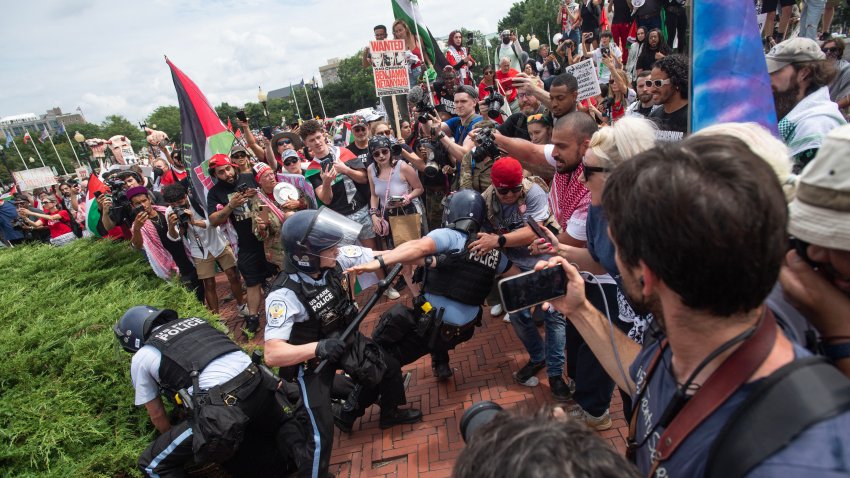 Pro-Palestinian protesters and police clash at Union Station in Washington, DC, on July 24 during a protest against Israeli Prime Minister Benjamin Netanyahu’s visit to the US. Netanyahu slammed Gaza ceasefire demonstrators and called for a global alliance against the Iranian regime he accuses of funding them, as he addressed a US Congress divided by the war. (Photo by Matthew Hatcher / AFP) (Photo by MATTHEW HATCHER/AFP via Getty Images)