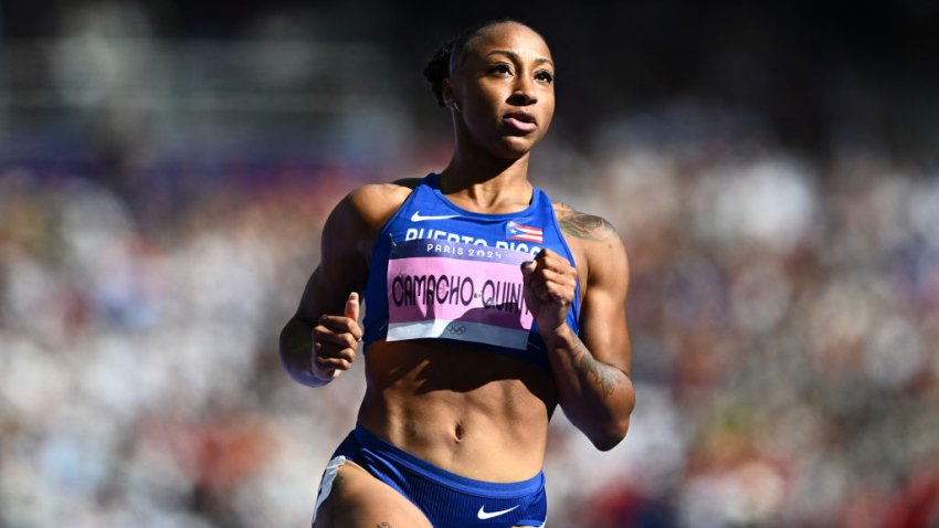 Puerto Rico’s Jasmine Camacho-Quinn reacts after competing in the women’s 100m hurdles heat of the athletics event at the Paris 2024 Olympic Games at Stade de France in Saint-Denis, north of Paris, on August 7, 2024. (Photo by Jewel SAMAD / AFP) (Photo by JEWEL SAMAD/AFP via Getty Images)