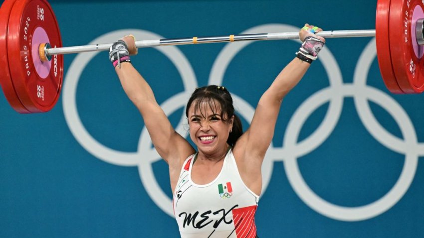 Mexico’s Janeth Gomez Valdivia competes in the women’s -59kg weightlifting event during the Paris 2024 Olympic Games at the South Paris Arena in Paris, on August 8, 2024. (Photo by Miguel MEDINA / AFP) (Photo by MIGUEL MEDINA/AFP via Getty Images)