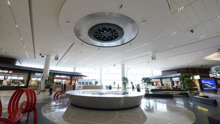 Members of the press get a tour of  LaGuardia Airport’s newly renovated Terminal B  on June 10, 2020, in New York. – The terminal opens to the public on June 13.