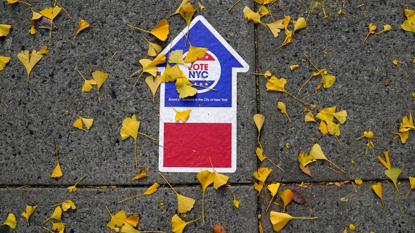 A sticker directs voters to a polling place at Alfred E. Smith Public School in New York City on November 8, 2022. (Photo by TIMOTHY A. CLARY / AFP) (Photo by TIMOTHY A. CLARY/AFP via Getty Images)