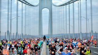 Runners cross the Verrazano Bridge before competing in the 52nd Edition of the New York City Marathon on November 5, 2023. (Photo by Kena Betancur / AFP) (Photo by KENA BETANCUR/AFP via Getty Images)