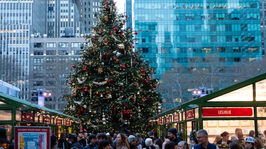 Shoppers at the Bryant Park Winter Village Holiday Market in New York, US, on Saturday, Dec. 16, 2023. (Photographer: Eilon Paz/Bloomberg via Getty Images)