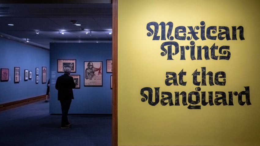 A person looks at art work during the “Mexican Prints at the Vanguard” exhibition press preview at The Metropolitan Museum of Art in New York on September 9, 2024. (Photo by ANGELA WEISS / AFP) (Photo by ANGELA WEISS/AFP via Getty Images)