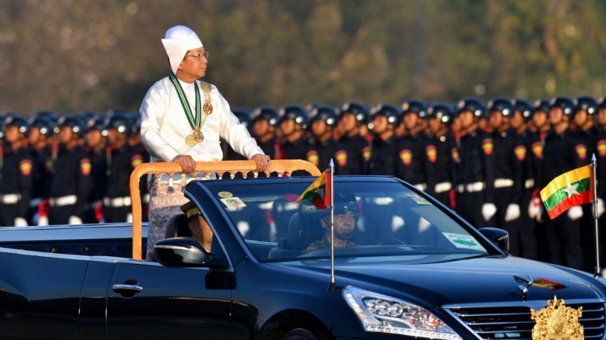 TOPSHOT – Myanmar’s military chief Min Aung Hlaing stands in a car as he oversees a military display at a parade ground to mark the country’s Independence Day in Naypyidaw on January 4, 2023. – Myanmar’s junta announced an amnesty for 7,000 prisoners to mark Independence Day on January 4 following a show of force in the capital, days after increasing democracy figurehead Aung San Suu Kyi’s jail term to 33 years. (Photo by AFP) (Photo by STR/AFP via Getty Images)