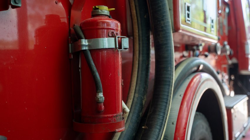 Firemen equipment on fire truck,Fire engine with equipment stay in the fire department.