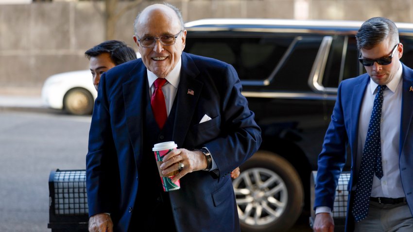 WASHINGTON, DC – DECEMBER 15: Rudy Giuliani (C), the former personal lawyer for former U.S. President Donald Trump, arrives to the E. Barrett Prettyman U.S. District Courthouse on December 15, 2023 in Washington, DC. A jury will continue deliberating over the money owed by Giuliani for the defamation of the Fulton County election workers Ruby Freeman and Shaye Moss. (Photo by Anna Moneymaker/Getty Images)