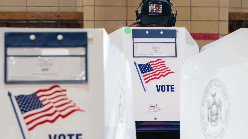 People vote at a polling station in the Queens borough of New York City on Election Day, November 5, 2024. (Photo by David Dee Delgado / AFP) (Photo by DAVID DEE DELGADO/AFP via Getty Images)