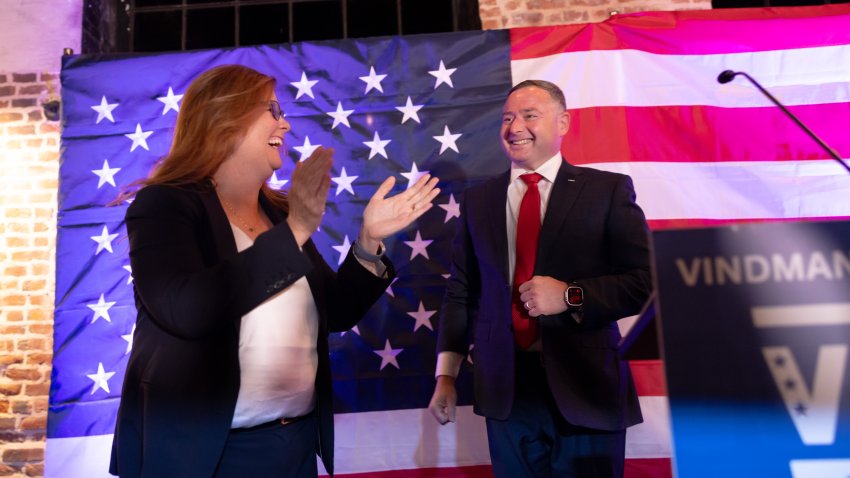 FREDERICKSBURG, VA – NOVEMBER 5:
Eugene Vindman, democratic candidate for Virginia’s 7th District congressional seat, and his wife, Cindy, take the stage to address his supporters at The Silk Mill in Fredericksburg, Va., November 5, 2024.
(Parker Michels-Boyce for The Washington Post via Getty Images)