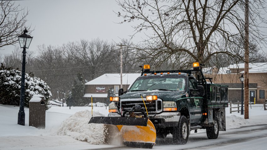 NEW HOPE, PENNSYLVANIA, UNITED STATES – 2021/02/01: City plow trucks were working extra hard to clear the streets during the storm. New Hope, Pennsylvania got covered in snow as the Northeast was hit by Winter Storm Orlena, the first snowstorm of the season, falling at the rate of 1 to 2 inches per hour; bringing more than a foot of snow to various major cities along the East Coast. The citys emergency management service advised residents to be aware of slippery conditions, also issued a travel advisory, particularly during the evening commute. (Photo by Erik McGregor/LightRocket via Getty Images)