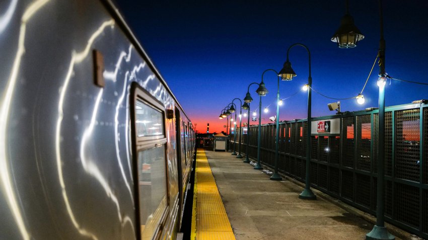 The sunset is seen from the platform of a subway train station in Rockaway in the Queens borough of New York on February 14, 2024. (Photo by Charly TRIBALLEAU / AFP) (Photo by CHARLY TRIBALLEAU/AFP via Getty Images)