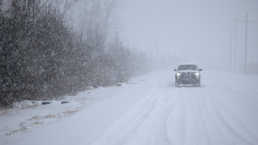 LOUISVILLE, KENTUCKY – JANUARY 5:  A motorist drives through the snow near Louisville Muhammad Ali International Airport on January 5, 2025 in Louisville, Kentucky. Local forecasts called for heavy snowfall followed by significant accumulation of freezing rain and ice. (Photo by Luke Sharrett/Getty Images)