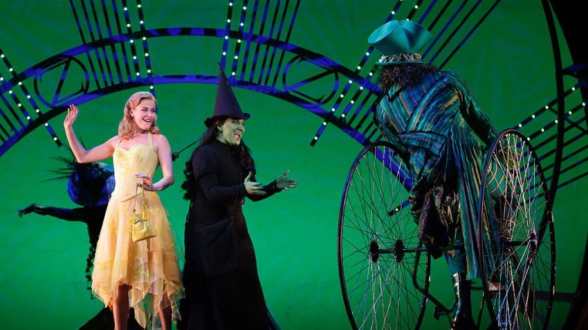 SINGAPORE – SEPTEMBER 30:  Performers Carly Anderson (L) playing the character ‘Glinda’ , Jacqueline Hughes (C) playing the character ‘Elphaba’ and cast members perform on stage during the ‘Wicked The Musical’ media preview  at the Grand Theatre, Marina Bay Sands on September 30, 2016 in Singapore. The award winning Broadway and West End musical runs from 29 September to 20 November 2016, Singapore.  (Photo by Suhaimi Abdullah/Getty Images)