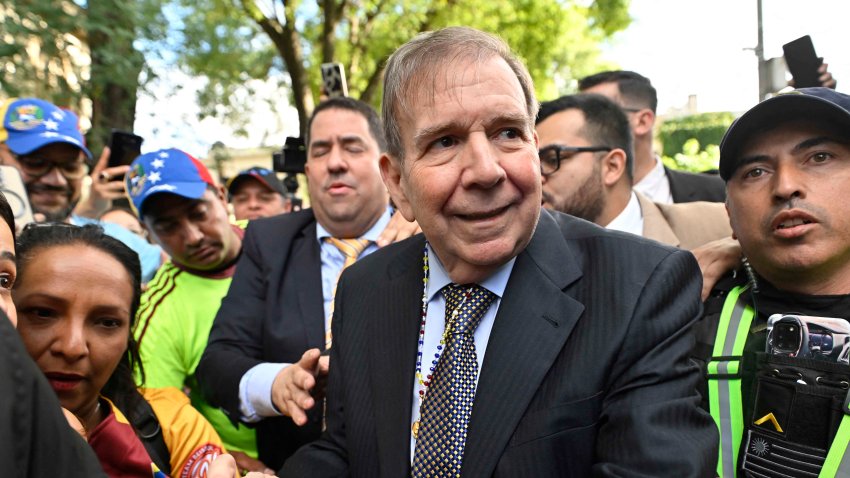 Venezuelan opposition leader Edmundo Gonzalez Urrutia greets supporters after a meeting with Uruguay’s President Luis Lacalle Pou at the Suarez and Reyes presidential residence in Montevideo on January 4, 2025. Edmundo Gonzalez Urrutia traveled to Uruguay on Saturday to meet with President Luis Lacalle Pou, following his meeting with Argentina’s President Javier Milei, on a regional tour to drum up support ahead of President Nicolas Maduro’s swearing-in for a third term. (Photo by Santiago Mazzarovich / AFP) (Photo by SANTIAGO MAZZAROVICH/AFP via Getty Images)