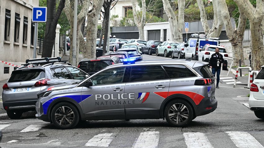 A French National Police car blocks off a street in front of the Russian consulate in Marseille, after three improvised explosive devices were thrown, on February 24, 2025. No one was injured, and only two of the three devices detonated in the attack on the third anniversary of Russia’s full-scale invasion of Ukraine, a police source said. (Photo by Miguel MEDINA / AFP) (Photo by MIGUEL MEDINA/AFP via Getty Images)