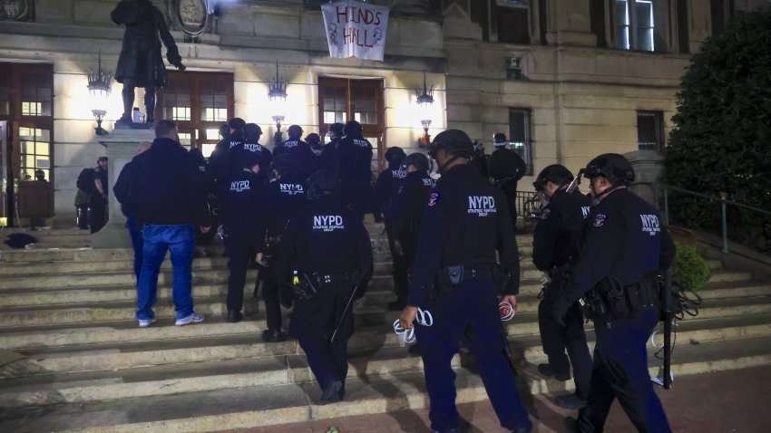 NEW YORK, UNITED STATES – APRIL 30: New York Police Department officers detain dozens of pro-Palestinian students at Columbia University after they barricaded themselves at the Hamilton Hall building near Gaza Solidarity Encampment earlier in New York, United States on April 30, 2024. (Photo by Selcuk Acar/Anadolu via Getty Images)