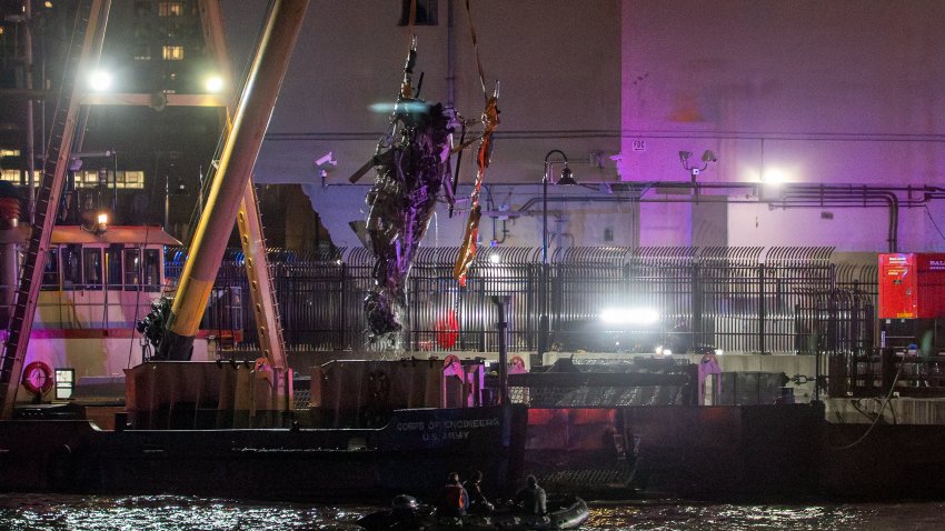 The wreckage of a helicopter that crashed into the Hudson River is extracted from the water in Jersey City, New Jersey, US, on Thursday, April 10, 2025. A helicopter crashed into the Hudson River on Thursday, killing all six people on board, the latest in a string of incidents in the past few months that has rattled confidence in aviation safety. Photographer: David Dee Delgado/Bloomberg via Getty Images