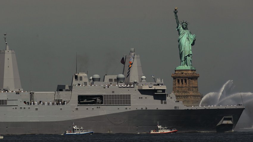 NEW YORK, NY – MAY 25:  Sailors stand on the deck as the USS New York as it  passes the Statue of Liberty during the start of Fleet Week May 25, 2011 in New York City. Fleet week, which has been held in New York City since 1984, celebrates the U.S. Navy and Marines Corps with a week of ship visitations and military demonstrations. Fleet Week concludes on Memorial Day with a military flyover to honor those killed while serving in the military.  (Photo by Spencer Platt/Getty Images)