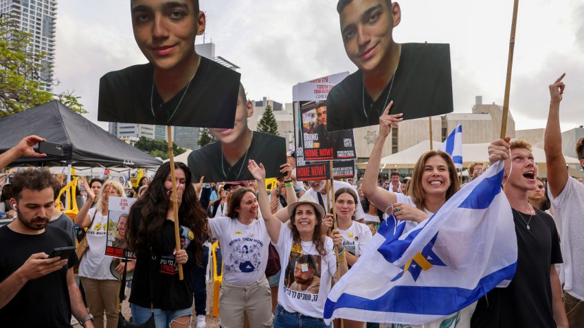 Israelis celebrate the release of Edan Alexander, an Israeli-US captive in the Gaza Strip since October 2023, at Hostages Square in Tel Aviv on May 12, 2025. Palestinian militant group Hamas announced on May 11, 2025 it would release Alexander as part of talks with the United States towards a ceasefire. (Photo by Menahem KAHANA / AFP) (Photo by MENAHEM KAHANA/AFP via Getty Images)