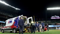 SEATTLE, WASHINGTON – MAY 12: Oswaldo Cabrera #95 of the New York Yankees is taken away in an ambulance during the ninth inning against the Seattle Mariners at T-Mobile Park on May 12, 2025 in Seattle, Washington. (Photo by Steph Chambers/Getty Images)
