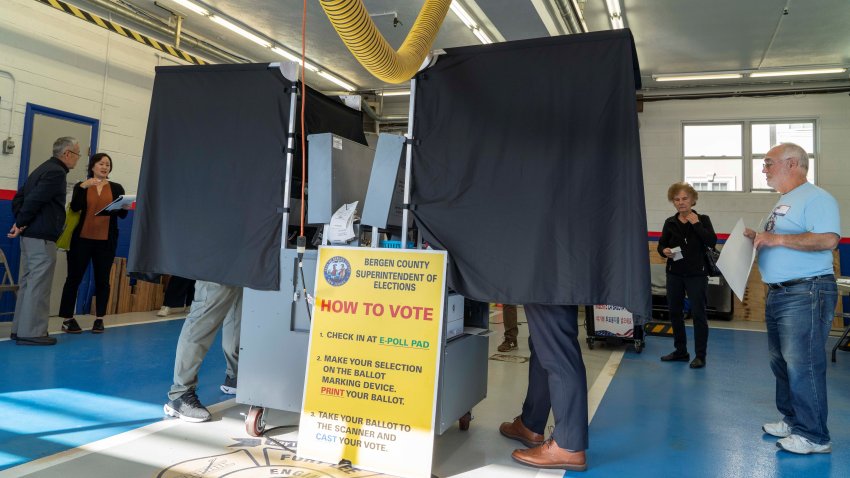 Voters are seen at a polling station during the 2024 U.S. presidential election in Fort Lee, New Jersey, the United States, on Nov. 5, 2024. (Photo by Ding Ye/Xinhua via Getty Images)