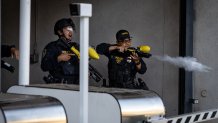 Los Angeles, CA - June 06: DHS police stand guard at the Metropolitan Detention Center as protesters gather in response to ICE raids in Los Angeles on Friday, June 6, 2025 in Los Angeles, CA. (Jason Armond / Los Angeles Times via Getty Images)
