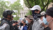 NEW YORK, US - JUNE 7: Police in New York intervened forcefully in a protest held in of migrants detained by US Immigration and Customs Enforcement (ICE) on Saturday, June 7, detaining several demonstrators and using pepper spray to disperse the crowd. Protesters had gathered in the city center to denounce immigration policies and ongoing detentions. Police moved in when crowds refused to disperse, deploying pepper spray during clashes with demonstrators. Several protesters were injured during the confrontation and were transported to nearby hospitals by ambulance. Protesters called for the protection of migrant rights and an end to ICE detentions. (Photo by Selcuk Acar/Anadolu via Getty Images)