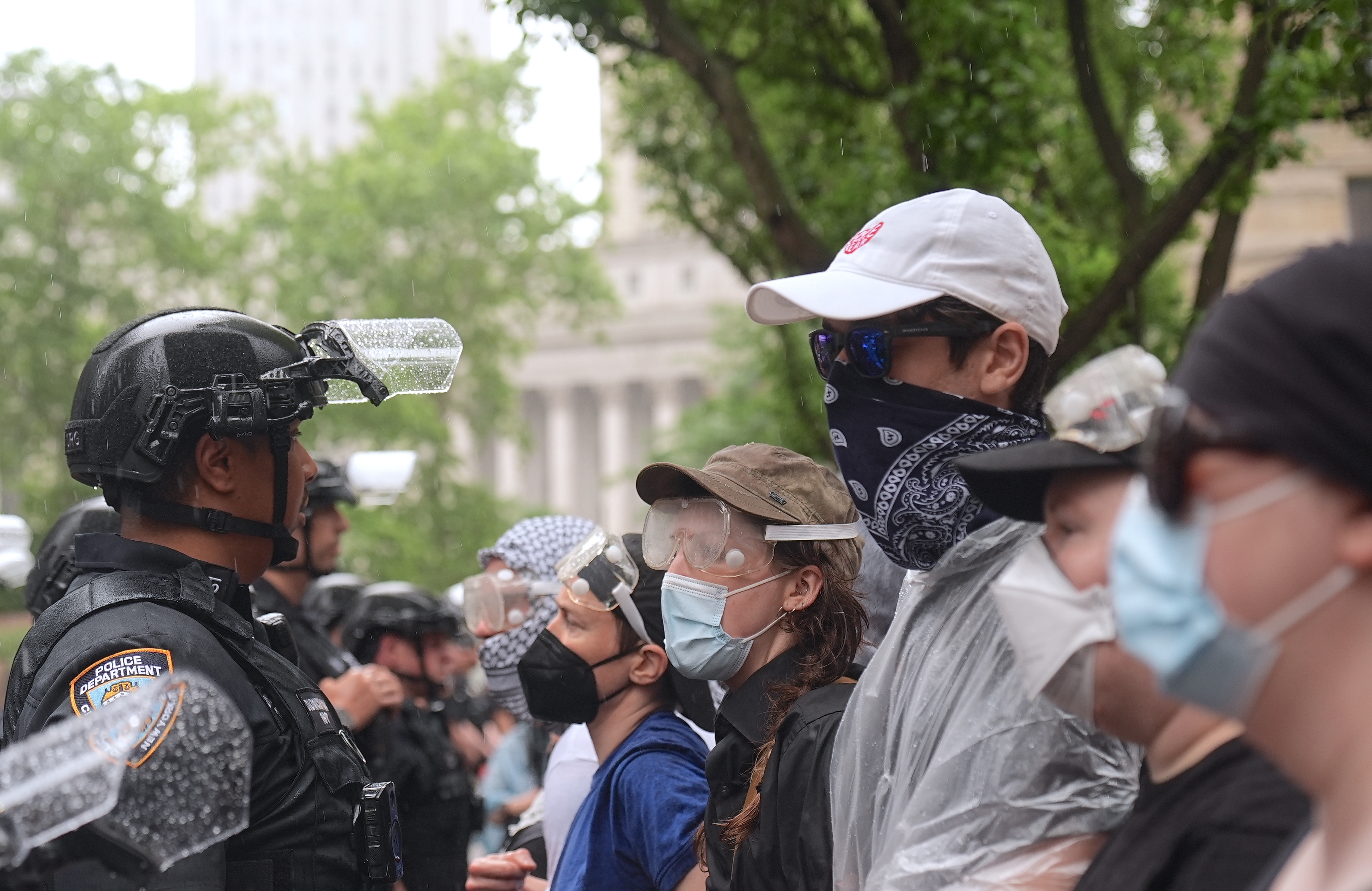NEW YORK, US - JUNE 7: Police in New York intervened forcefully in a protest held in  of migrants detained by US Immigration and Customs Enforcement (ICE) on Saturday, June 7, detaining several demonstrators and using pepper spray to disperse the crowd. Protesters had gathered in the city center to denounce immigration policies and ongoing detentions. Police moved in when crowds refused to disperse, deploying pepper spray during clashes with demonstrators. Several protesters were injured during the confrontation and were transported to nearby hospitals by ambulance. Protesters called for the protection of migrant rights and an end to ICE detentions. (Photo by Selcuk Acar/Anadolu via Getty Images)
