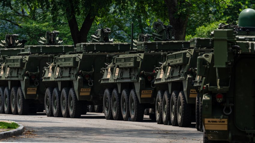 Military vehicles are lined up ahead of the US Army’s 250th Anniversary Parade in Washington, DC, US, on Wednesday, June 11, 2025. US President Donald Trump will host a military parade marking the 250th birthday of the US Army, as well as his own 79th birthday, later this week. Photographer: Eric Lee/Bloomberg via Getty Images