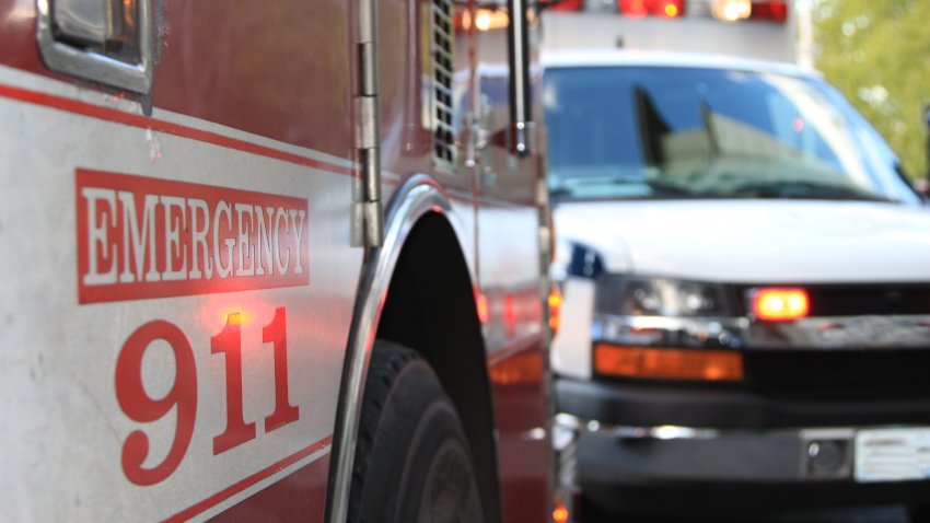 This is an emergency scene including both a fire engine and an ambulance.