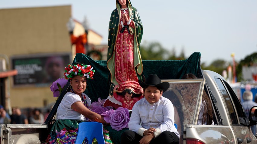 People take part in the 87th Annual Procession and Mass in honor of Our Lady of Guadalupe in Los Angeles, California on December 9, 2018. The Catholic procession is the oldest religious procession in Los Angeles and celebrates the apparition of the Virgin Mary in Mexico in 1531.  (Photo by Ronen Tivony/NurPhoto via Getty Images)