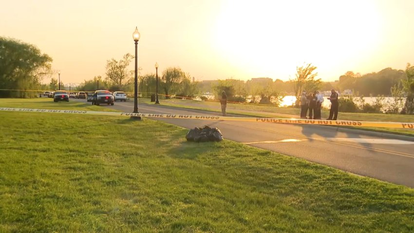 Police investigating the scene where a boy drowned in the Anacostia River.