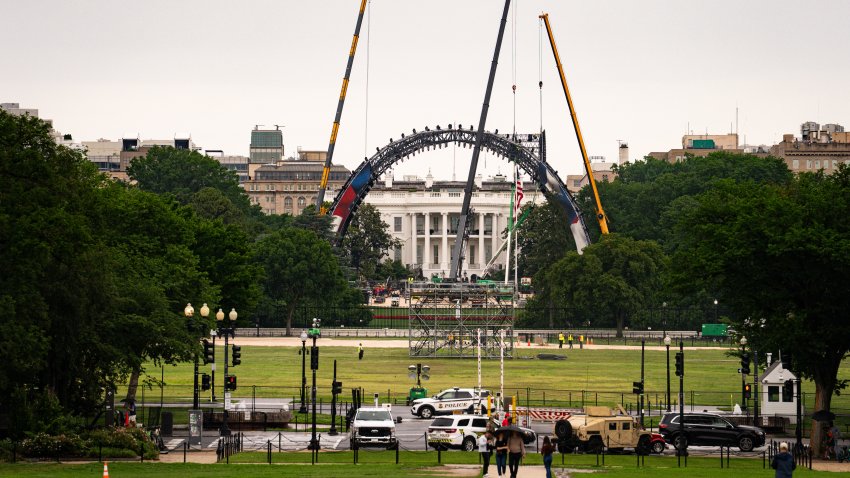 Workers construct a UFC fighting ring ahead of a planned Ultimate Fighting Championship (UFC) fight on the South Lawn of the White House in Washington, DC, US, on Tuesday, May 26, 2026. UFC is planning to host a cage match at the White House on June 14. Photographer: Al Drago/Bloomberg via Getty Images