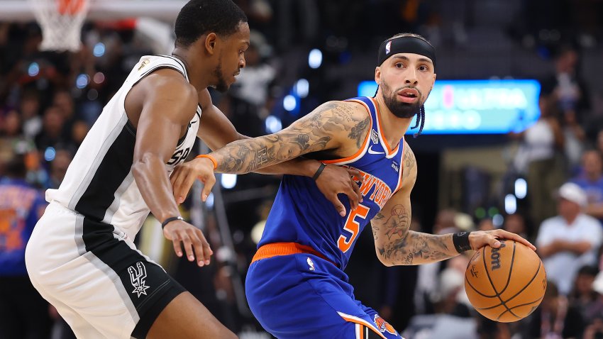 SAN ANTONIO, TEXAS – JUNE 13: Jose Alvarado #5 of the New York Knicks dribbles against De’aaron Fox #4 of the San Antonio Spurs during the fourth quarter in Game Five of the 2026 NBA Finals at Frost Bank Center on June 13, 2026 in San Antonio, Texas. NOTE TO USER: User expressly acknowledges and agrees that, by downloading and or using this photograph, User is consenting to the terms and conditions of the Getty Images License Agreement. (Photo by Gregory Shamus/Getty Images)