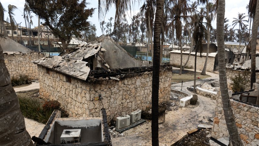 View of damaged structures and debris at the Viva Dominicus Beach hotel premises following a fire in Bayahibe, La Altagracia province, Dominican Republic, on July 20, 2026. An Italian tourist died on June 19 after inhaling smoke from a large fire at a hotel in the resort town of Bayahibe, southeastern Dominican Republic, an official told AFP. (Photo by Erickson Polanco / AFP via Getty Images)