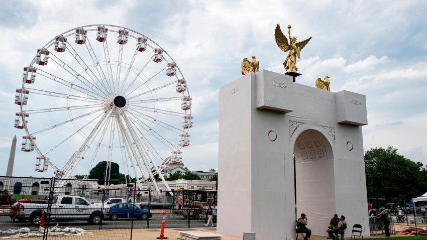 WASHINGTON, DC – JUNE 22: An arch across the street from a 110-foot "Freedom 250″ Ferris wheel during final preparations for the Great American State Fair on the National Mal on Monday, June 22, 2026 in Washington, DC. (Photo by Al Drago for The Washington Post via Getty Images)