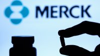 Medicine pill is seen with Merck logo displayed on a screen in the background in this illustration photo taken in Poland on October 4, 2021. (Photo by Jakub Porzycki/NurPhoto via Getty Images)